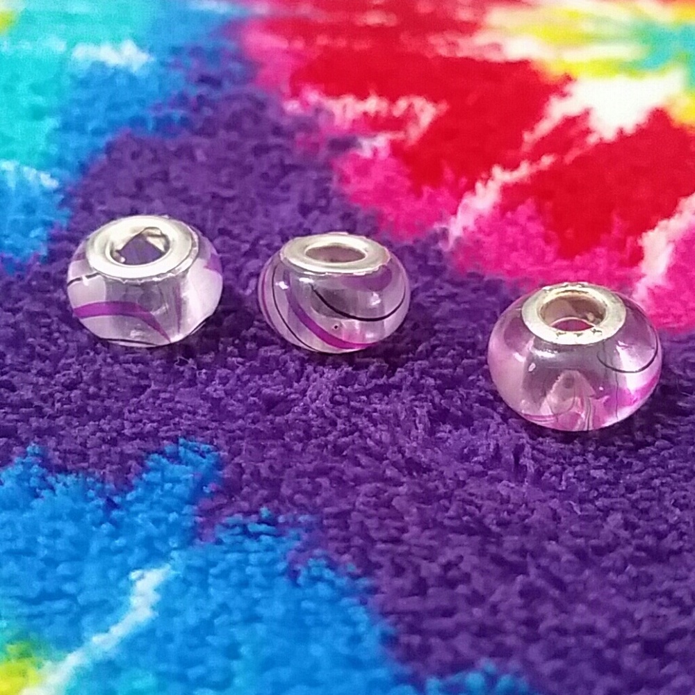 3 pink swirl beads